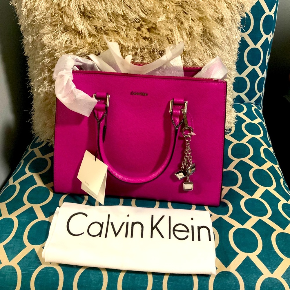 Hot pink leather bag with duster
